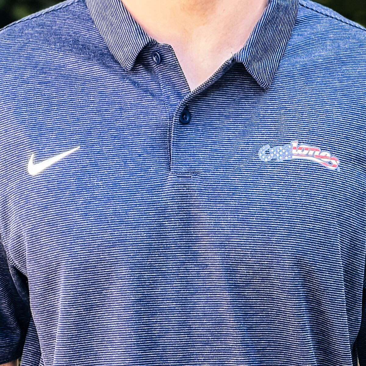 Nike Patriotic Cyclones Script Navy Polo design close up